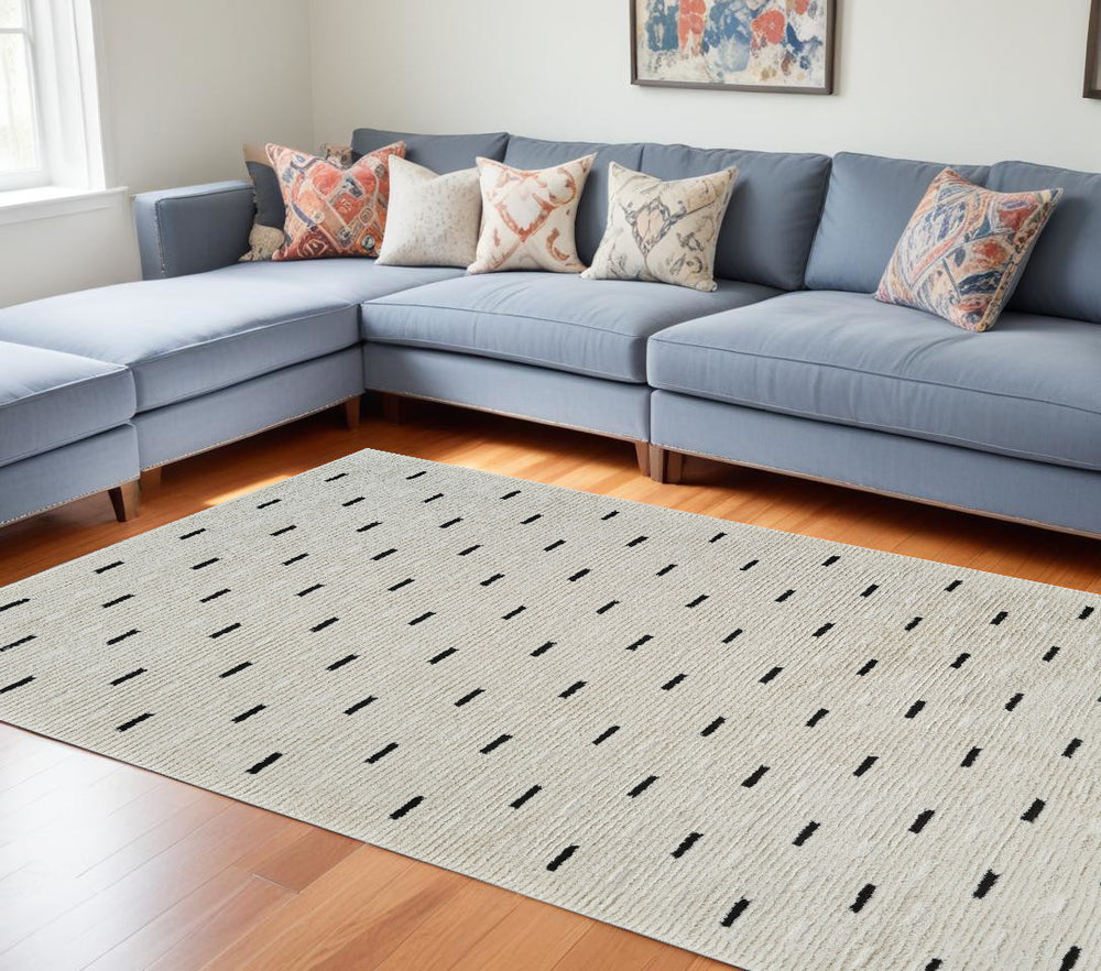 Homeroots 8' X 11' Cream And Black Abstract Distressed Area Rug  Polypropylene 559047