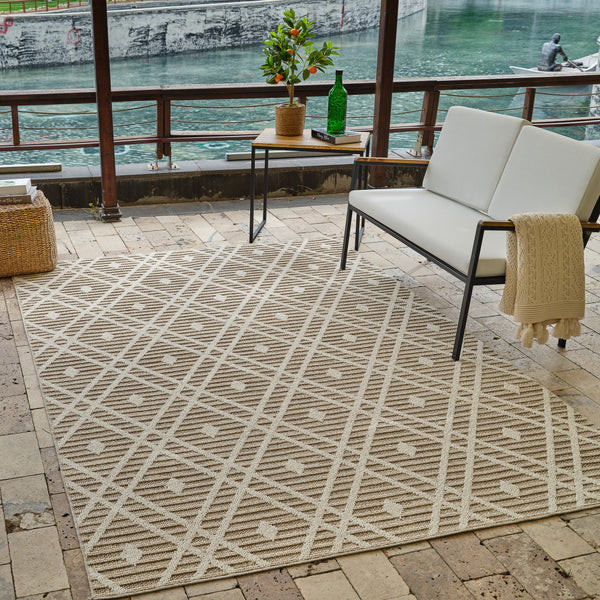 Homeroots 4' X 6' Cream And Brown Geometric Distressed Indoor Outdoor Area Rug  Polypropylene 559049