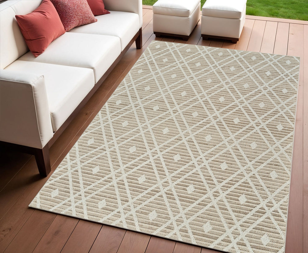 Homeroots 4' X 6' Cream And Brown Geometric Distressed Indoor Outdoor Area Rug  Polypropylene 559049