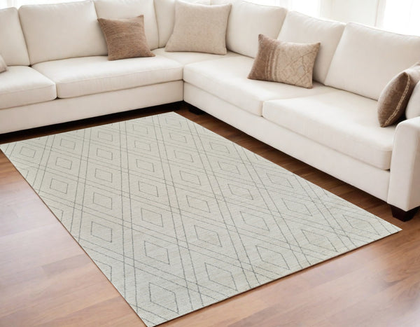 Homeroots 5' X 8' Beige And Gray Abstract Non Skid Area Rug  Polyester 559080
