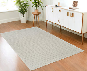 Homeroots 4' X 6' Cream And Beige Abstract Distressed Area Rug  Polyester 559115