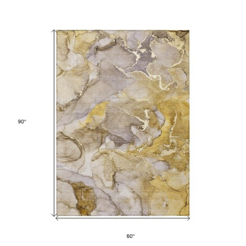 Homeroots 9' Gray And Gold Abstract Washable Indoor Outdoor Area Rug - Stylish Stain Resistant Non-skid Design 5' X 8' Polyester 559199