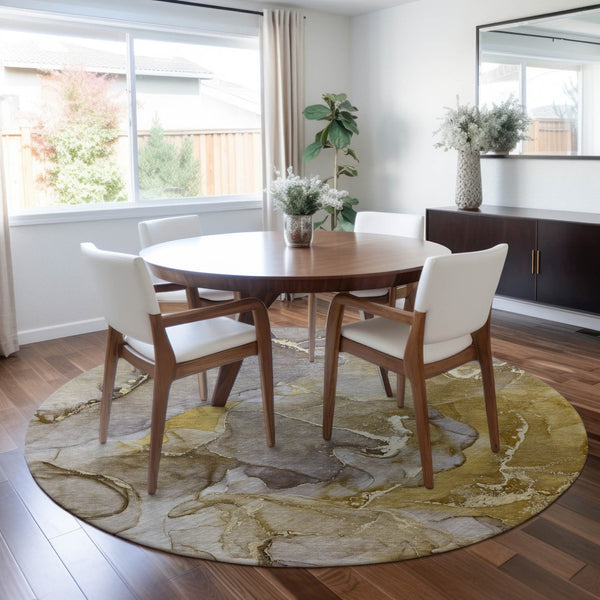 HomeRoots 5' Modern Gray and Gold Abstract Area Rug - Washable Non-Skid Design for Indoor and Outdoor Spaces 8' Round 559200