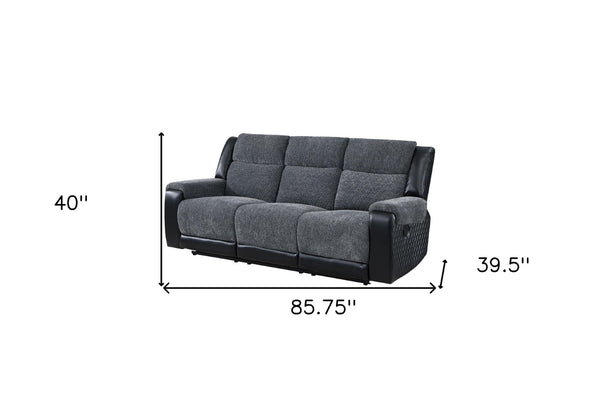 HomeRoots 86" Black and Gray Reclining Sofa with USB Port, Plush Arms & Modern Silver Legs for Comfort 559211