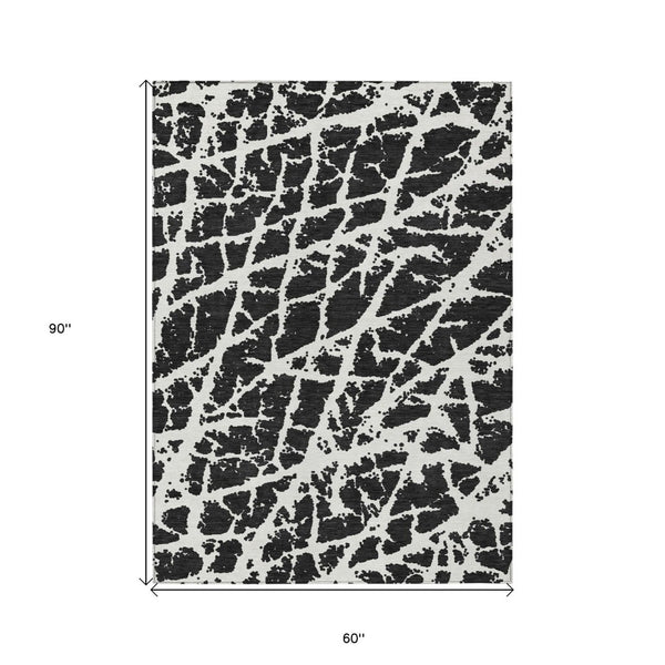 HomeRoots 5' Beige and Ivory Abstract Area Rug - Washable, Non-Skid, Stylish for Indoor and Outdoor Spaces 5' X 8' 559239