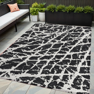 HomeRoots 5' Beige and Ivory Abstract Area Rug - Washable, Non-Skid, Stylish for Indoor and Outdoor Spaces 5' X 8' 559239