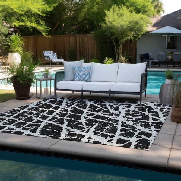 HomeRoots 5' Beige and Ivory Abstract Area Rug - Washable, Non-Skid, Stylish for Indoor and Outdoor Spaces 5' X 8' 559239