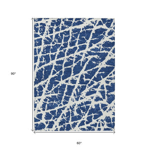 HomeRoots 5' Beige and Ivory Abstract Area Rug - Washable, Non-Skid, Stylish for Indoor and Outdoor Spaces 5' X 8' 559635