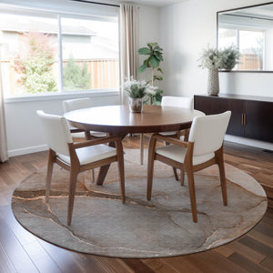 Homeroots 8' Round Taupe Round Abstract Washable Non Skid Indoor Outdoor Area Rug Taupe Polyester 559834