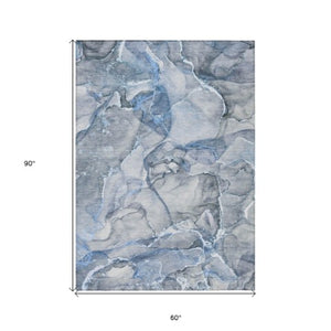 Homeroots 5' Abstract Washable Non-skid Area Rug - Stylish Blue And Gray Design For Indoor & Outdoor Use 5' X 8' Polyester 560343
