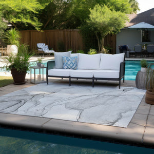HomeRoots 5' Contemporary Beige and Ivory Abstract Washable Area Rug for Indoor and Outdoor Use, Non-Skid 10' X 14' 560554