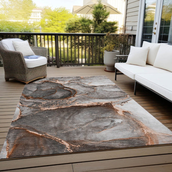 HomeRoots 5' Modern Gray and Gold Abstract Area Rug - Washable, Non-Skid, UV Resistant for Indoor/Outdoor Use 5' X 8' 560631