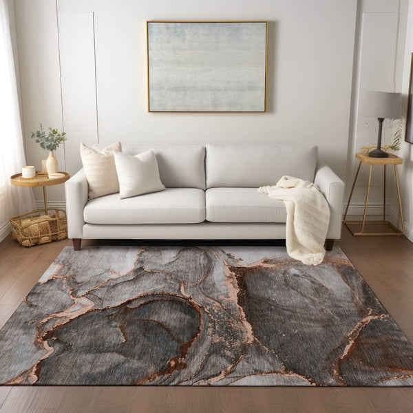 HomeRoots 5' Modern Gray and Gold Abstract Area Rug - Washable, Non-Skid, UV Resistant for Indoor/Outdoor Use 5' X 8' 560631