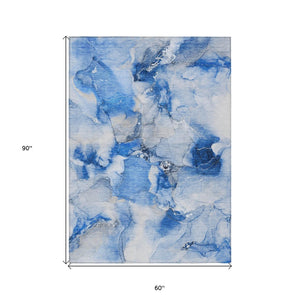HomeRoots 5' Vibrant Abstract Area Rug in Blue, Pink, and Green - Washable, Durable, Perfect for Indoor & Outdoor 5' X 8' 560649