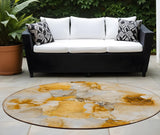 Homeroots 8' X 8' Orange And Ivory Round Abstract Washable Indoor Outdoor Area Rug Orange Polyester 560659