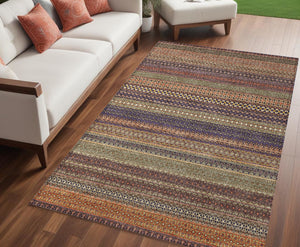 Homeroots 5' X 8' Orange Striped Washable Non Skid Indoor Outdoor Area Rug Paprika Polyester 560766