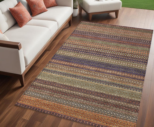 Homeroots 5' X 8' Orange Striped Washable Non Skid Indoor Outdoor Area Rug Paprika Polyester 560766