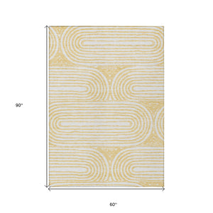 Homeroots 5' X 8' Gold And White Abstract Washable Non Skid Indoor Outdoor Area Rug Gold Polyester 561835