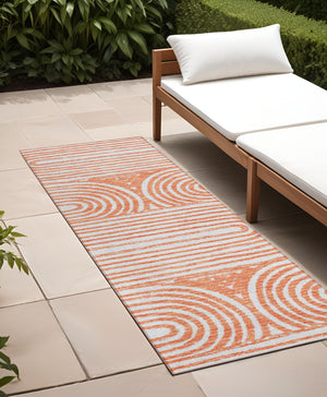 Homeroots 2' X 8' Orange And Ivory Abstract Washable Non Skid Indoor Outdoor Area Rug Salmon Polyester 561859