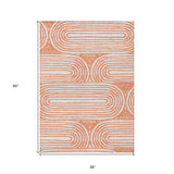 Homeroots 3' X 5' Orange And Ivory Abstract Washable Non Skid Indoor Outdoor Area Rug Salmon Polyester 561861