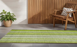 Homeroots 2' X 8' Green Striped Washable Non Skid Indoor Outdoor Runner Rug Green Polyester 562048