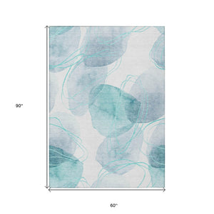 HomeRoots 5' Green and Ivory Abstract Washable Area Rug - Durable Non-Skid Design for Indoor & Outdoor Spaces 5' X 8' 562132
