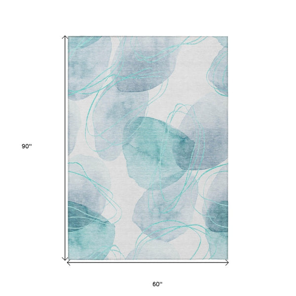 HomeRoots 5' Green and Ivory Abstract Washable Area Rug - Durable Non-Skid Design for Indoor & Outdoor Spaces 5' X 8' 562132