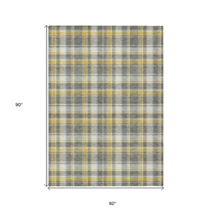 Homeroots 3' Stylish Black, Gray, And White Plaid Washable Non-skid Area Rug For Indoor And Outdoor Use 5' X 8' Polyester 563353