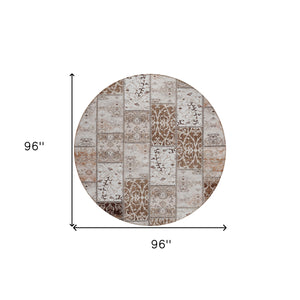 Homeroots 8' Round Taupe And Ivory Round Patchwork Washable Non Skid Indoor Outdoor Area Rug Beige Polyester 563525