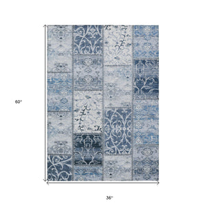 Homeroots 3' X 5' Denim Blue Patchwork Washable Non Skid Indoor Outdoor Area Rug Denim Polyester 563541