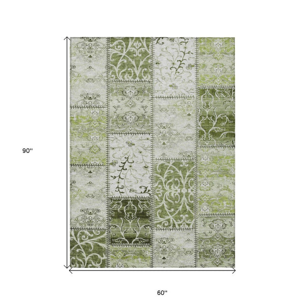HomeRoots 5' Green Patchwork Area Rug - Washable, Non-Skid, Stain-Resistant for Indoor & Outdoor Spaces 5' X 8' 563560