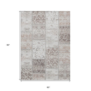 HomeRoots 5' Taupe Patchwork Distressed Area Rug - Durable, Washable Design for Indoor & Outdoor Elegance 5' X 8' 563578