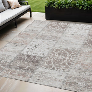 HomeRoots 5' Taupe Patchwork Distressed Area Rug - Durable, Washable Design for Indoor & Outdoor Elegance 5' X 8' 563578