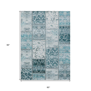 Homeroots 5' X 8' Teal Patchwork Washable Non Skid Indoor Outdoor Area Rug Teal Polyester 563587