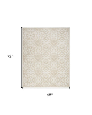 Homeroots 4' X 6' Beige And Ivory Floral Non Skid Area Rug  Polypropylene 563954