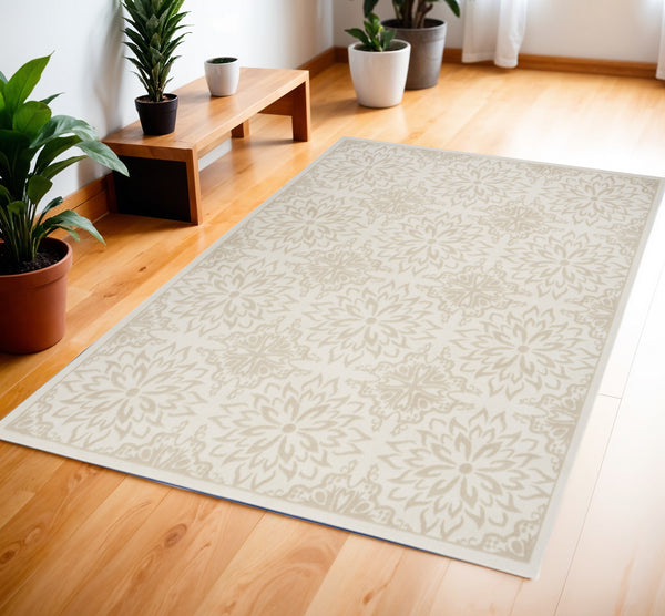 Homeroots 4' X 6' Beige And Ivory Floral Non Skid Area Rug  Polypropylene 563954
