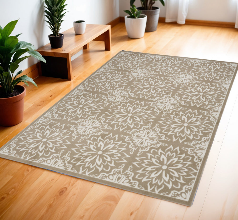 Homeroots 4' X 6' Taupe And Ivory Floral Non Skid Area Rug  Polypropylene 563955