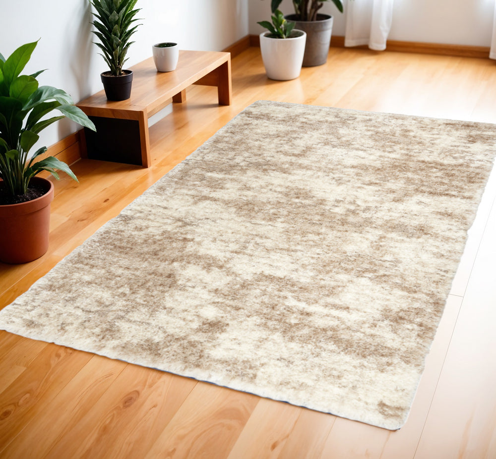Homeroots 4' X 6' Beige And Ivory Abstract Shag Area Rug  Polyester 564066