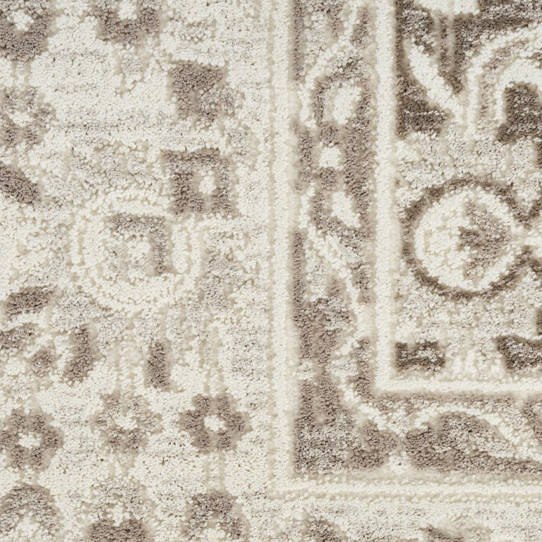 HomeRoots Floral Distressed Polyester Area Rug with Non-skid Backing Low Pile for Living Rooms 4' X 6' 564071