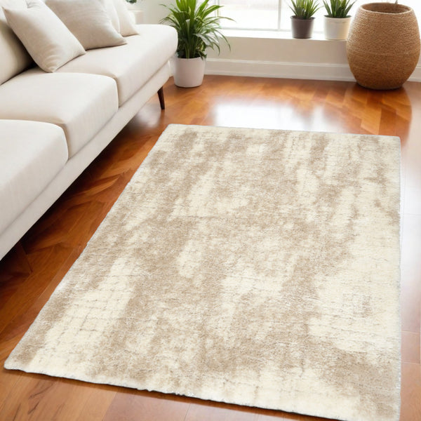 Homeroots 5' X 7' Beige And Ivory Abstract Shag Area Rug  Polyester 564078
