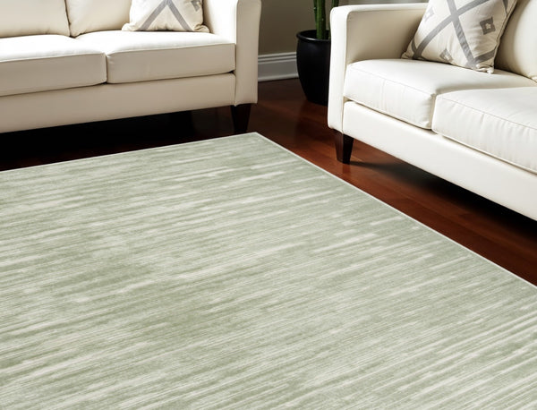 HomeRoots 7' Contemporary Green Geometric Area Rug - Stylish Low-Pile Design for Modern Living Spaces 7' X 9' 564100