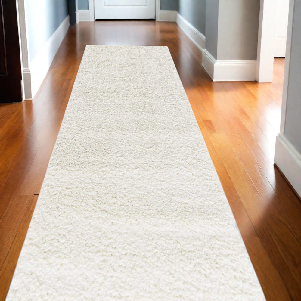 Homeroots 10' Cream Shag Non Skid Runner Rug - Stain Resistant, Durable, Soft Texture For Kids & Pets' Spaces  Polypropylene 564162