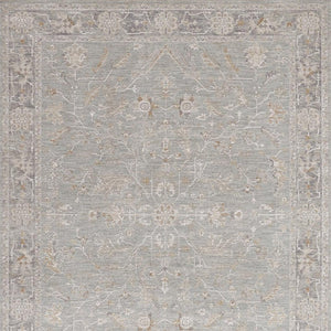 HomeRoots 8' Blue Floral Power Loom Area Rug - Elegant Distressed Design with Fringed Edges for Timeless Charm 8' X 10' 564167