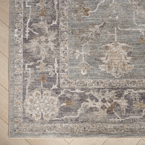 HomeRoots 8' Blue Floral Power Loom Area Rug - Elegant Distressed Design with Fringed Edges for Timeless Charm 8' X 10' 564167