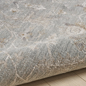 HomeRoots 8' Blue Floral Power Loom Area Rug - Elegant Distressed Design with Fringed Edges for Timeless Charm 8' X 10' 564167