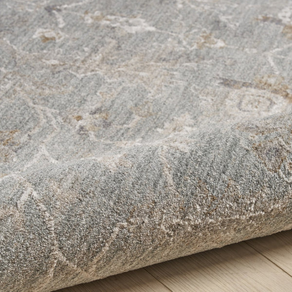 HomeRoots 8' Blue Floral Power Loom Area Rug - Elegant Distressed Design with Fringed Edges for Timeless Charm 8' X 10' 564167