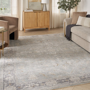 HomeRoots 8' Blue Floral Power Loom Area Rug - Elegant Distressed Design with Fringed Edges for Timeless Charm 8' X 10' 564167