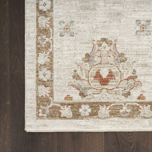 HomeRoots 9' Cream Floral Power Loom Distressed Area Rug with Fringed Tassels for Timeless Elegance 9' X 13' 564193