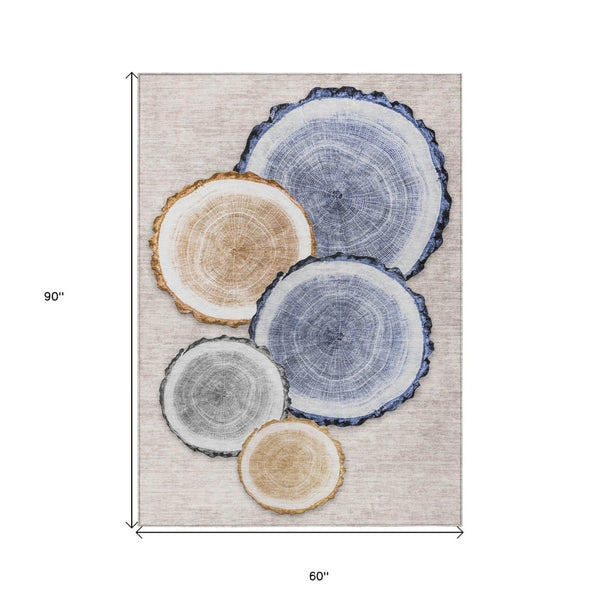 HomeRoots 5' Stylish Beige Blue and Gold Faux Bois Area Rug for Indoor and Outdoor Spaces, Washable Design 5' X 8' 564396