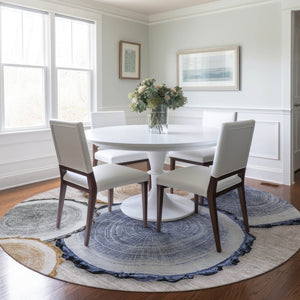 HomeRoots 5' Stylish Beige Blue and Gold Faux Bois Area Rug for Indoor and Outdoor Spaces, Washable Design 8' Round 564397